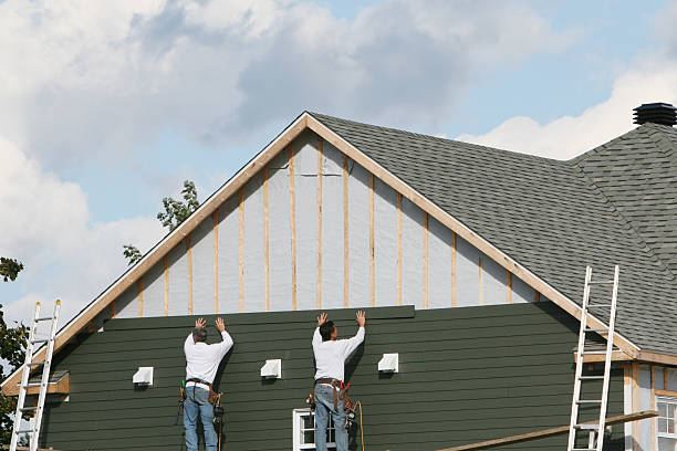 Professional Emergency Siding Repair technician working in Westville, IL